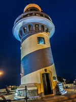 20140508183649-Light_Tower_of_Las_Penas_at_Night